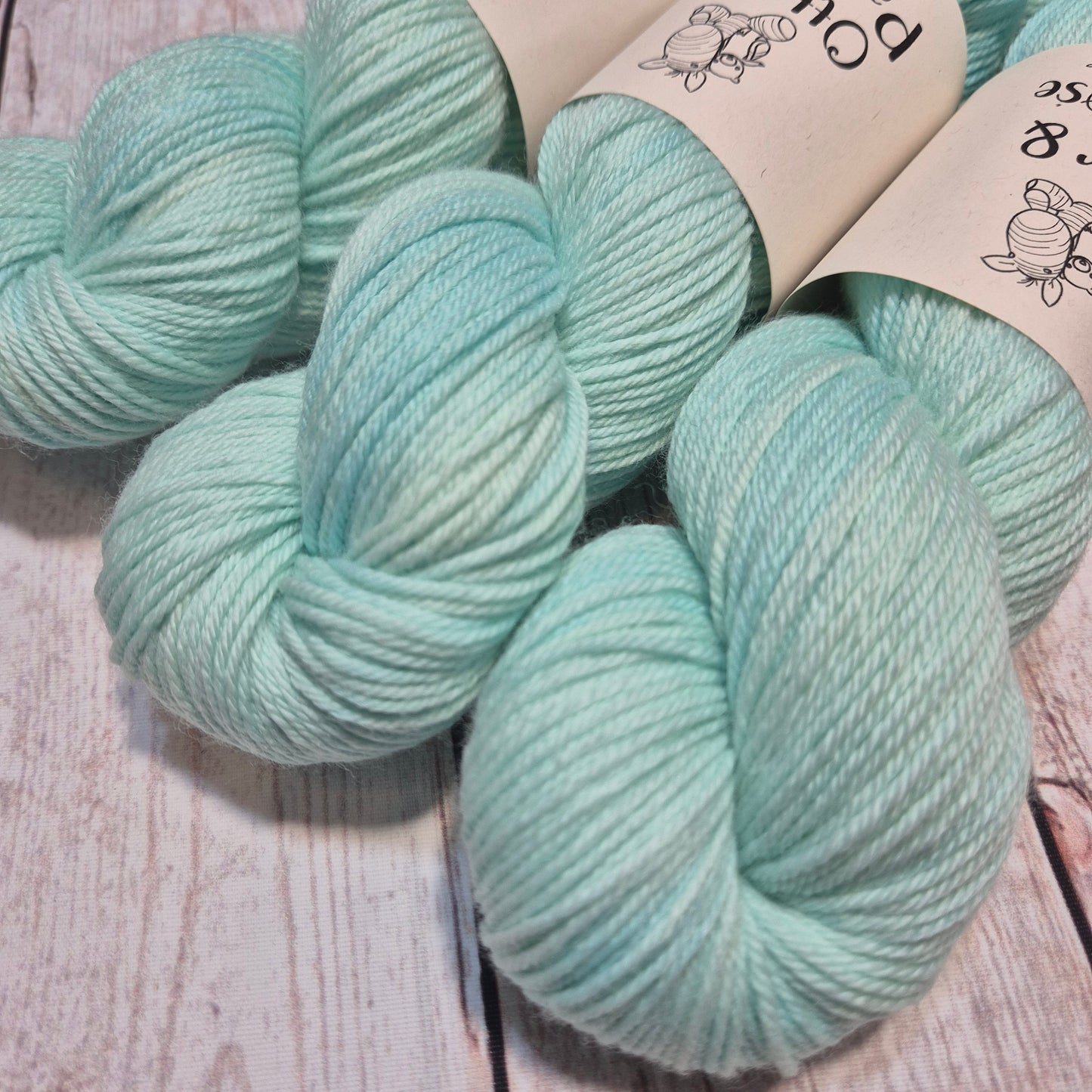 Ice Queen (glows under UV light) - Hand dyed yarn - DK Merino nylon